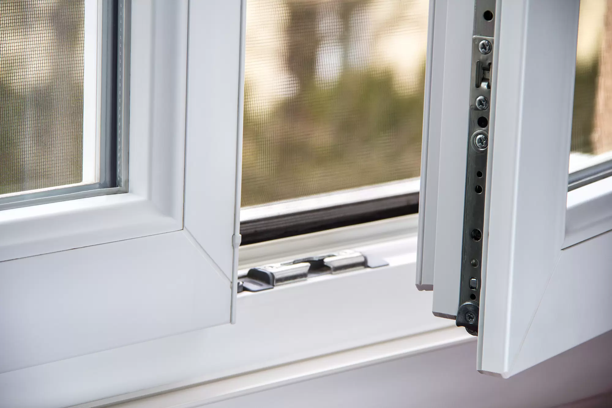 Close-up of a hinged window.