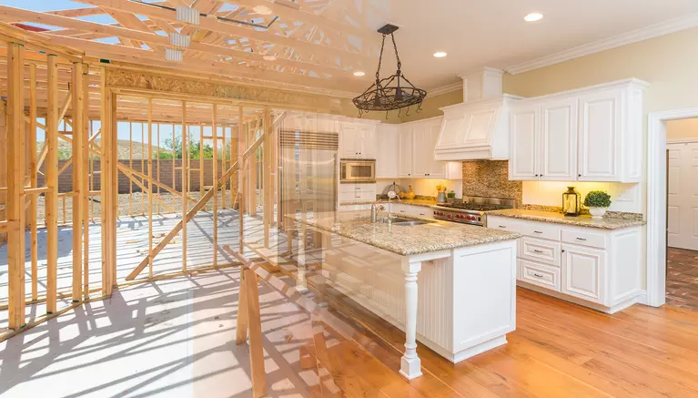 An image depicting the process of home remodeling, from the framework and building process and to the final result.