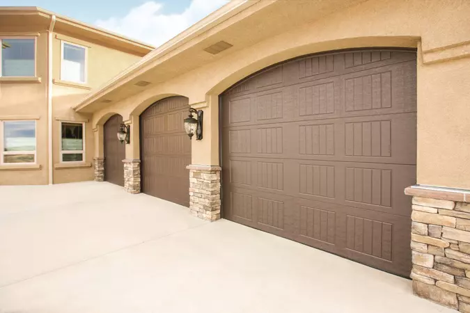 Brown sonoma panel garage doors with no windows