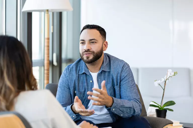  A salesman engaging with a customer.