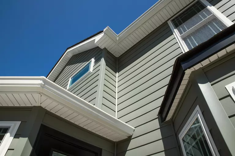 Exterior second story of a home from ground level.