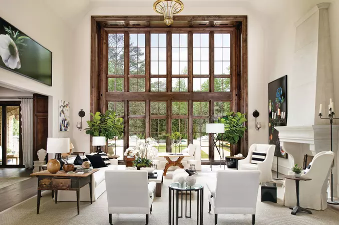 Beautiful brown interior wood-clad direct set & radius windows in a living room with a very tall ceiling