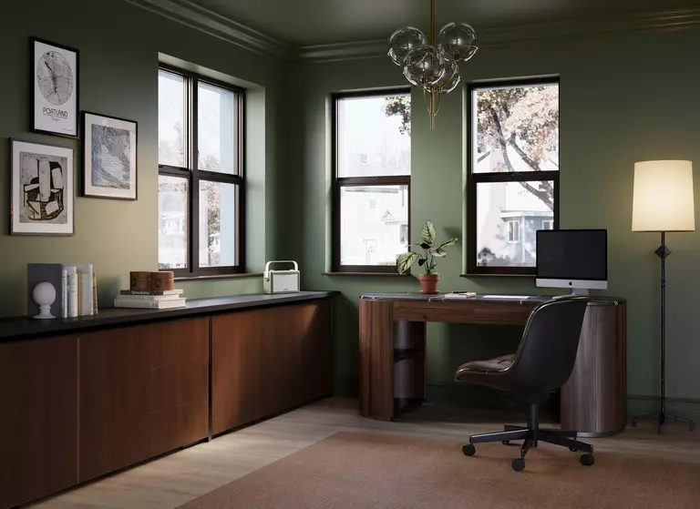 Home office with double-hung windows, a computer, chair, and desk shown.