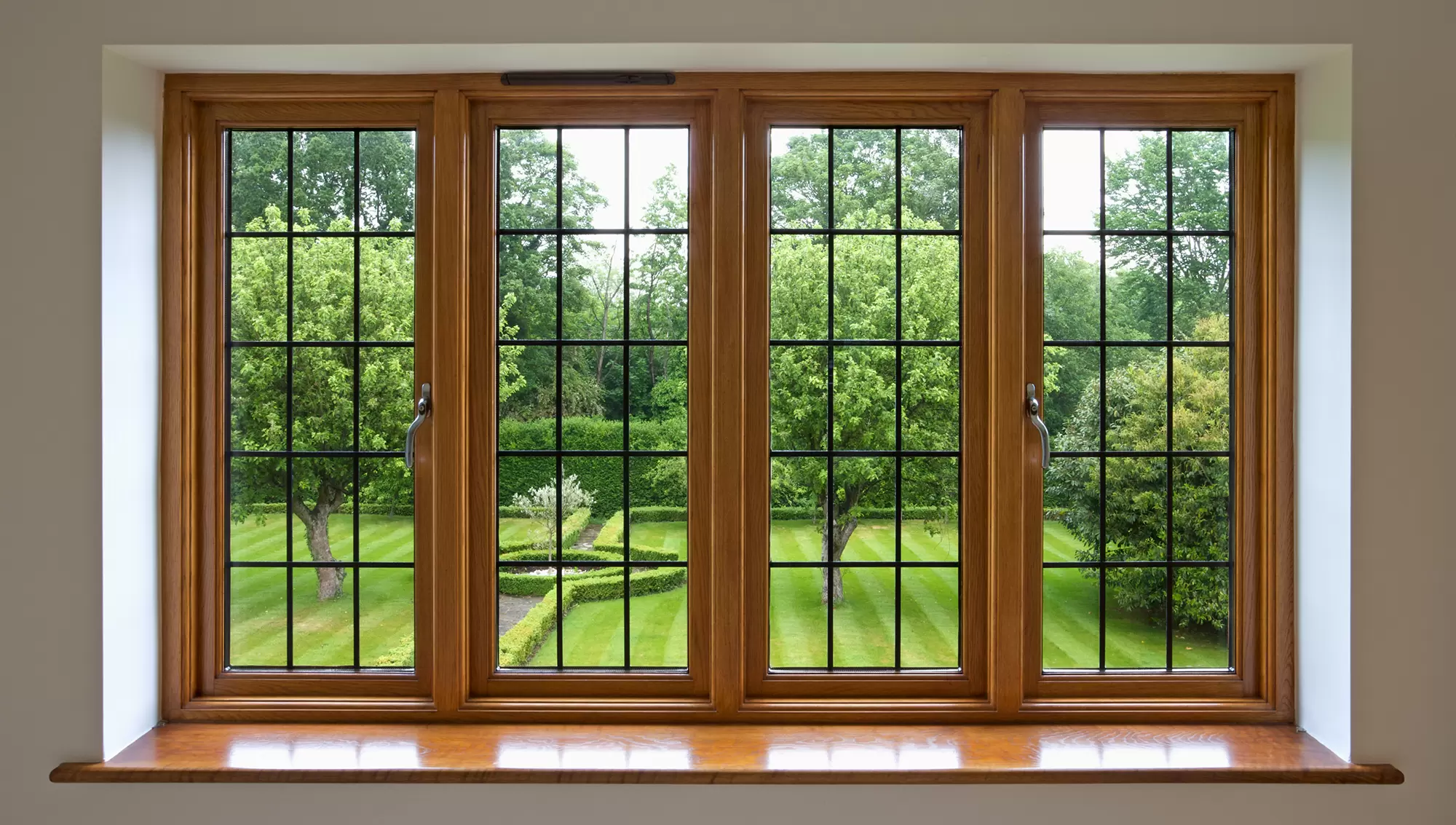 Home dining room with a four-pane bow window.