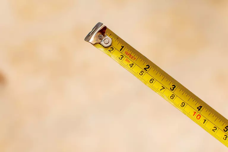 Close-up of yellow measuring tape.