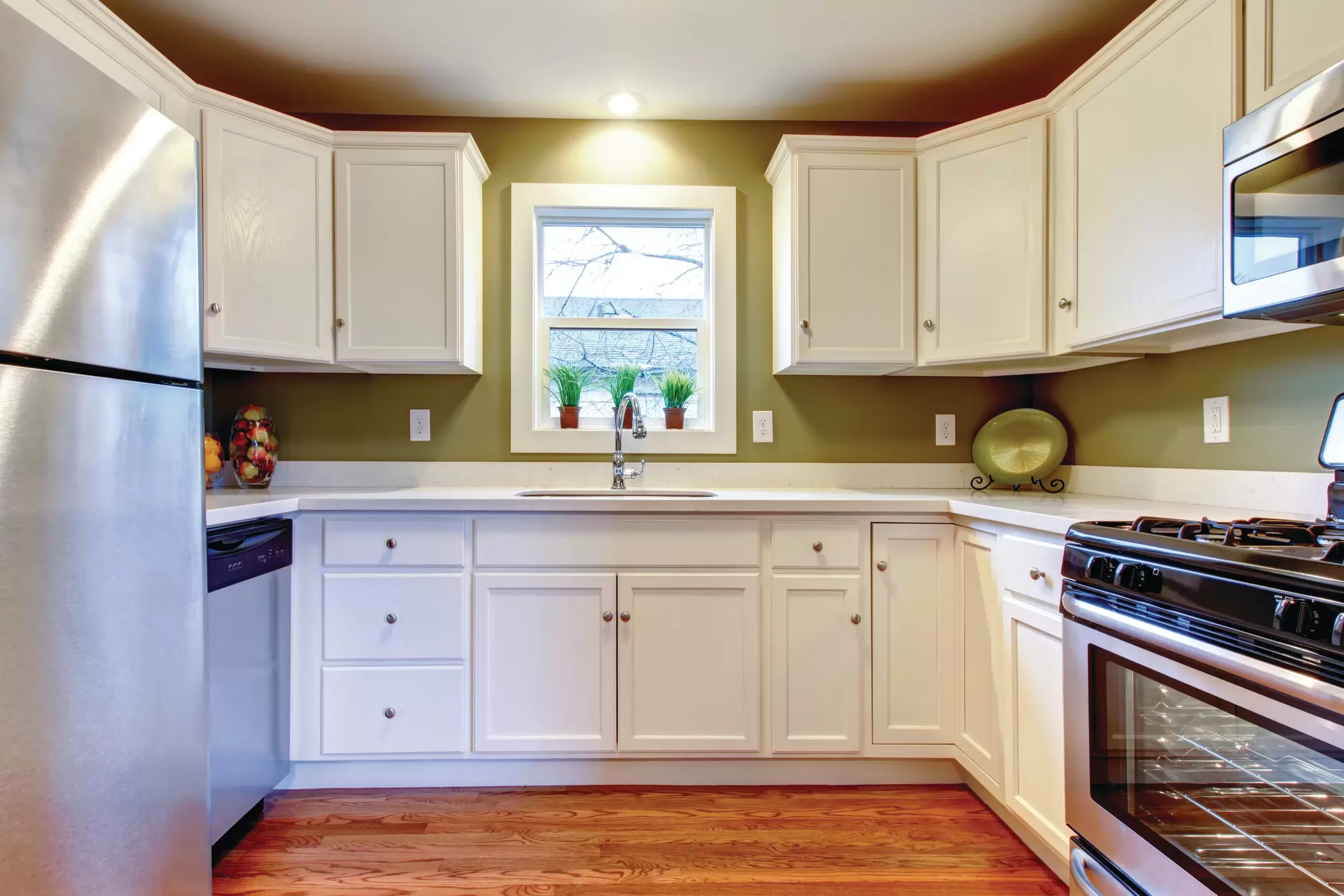 Small kitchen with a single-hung window.