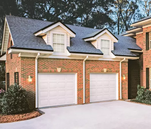 White colonial panel garage doors with no windows