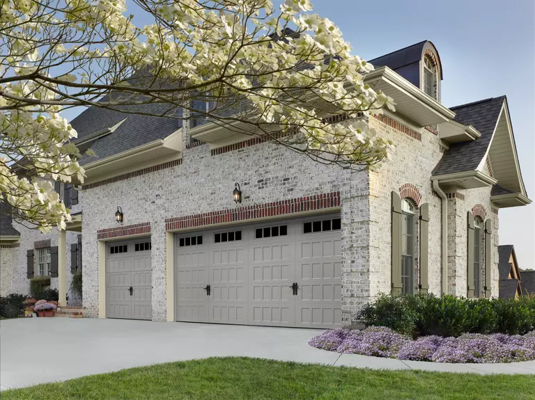 Home with an attached three-car garage.